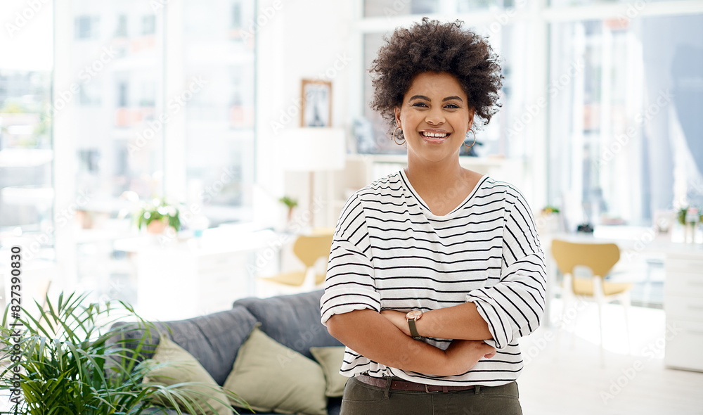 Wall mural Portrait, arms crossed and African woman in modern office with smile for startup, small business and entrepreneur. Female psychologist, pride and therapy for mental health with counselling advice