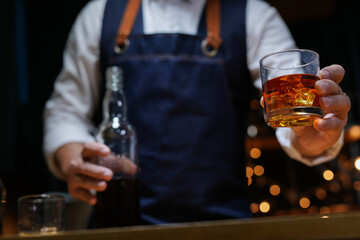 Bartender Serve Whiskey, on wood bar, 