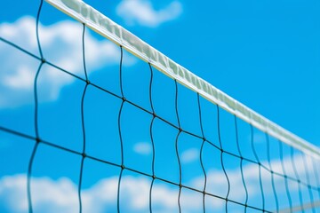 Vibrant beach volleyball net against blue sky  summer olympic games sport concept