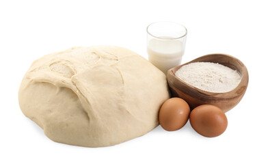 Raw dough and ingredients isolated on white
