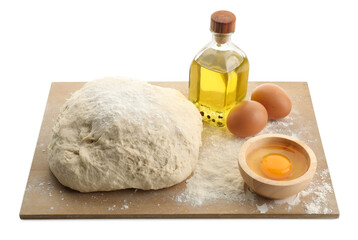 Raw dough and ingredients isolated on white