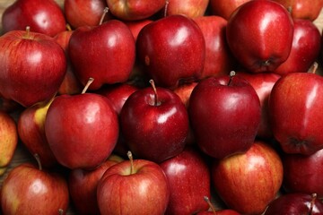 Fresh ripe red apples as background, top view