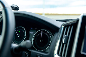 Car speedometer. High speed on a car speedometer and motion blur.