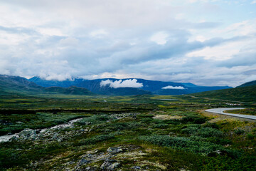 Norwegian Scenic Route Valdresflye passing through mountainous landscape in Jotunheimen 