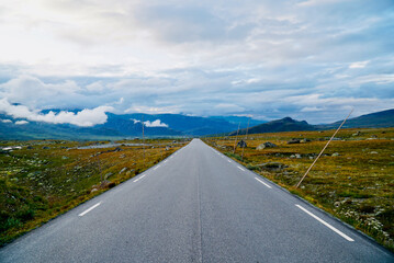 Norwegian Scenic Route Valdresflye passing through mountainous landscape in Jotunheimen 