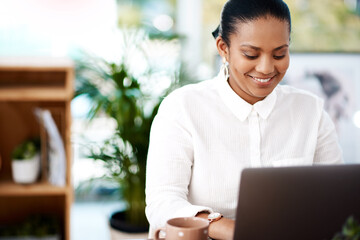 Black girl, typing and laptop in business office for career in journalism, online and working on...