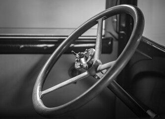 Dashboard and steering wheel of old-timer car