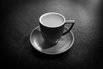 cup with  coffee  on the table