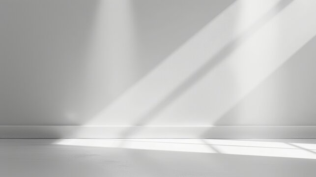 light grey background for product presentation with beautiful lights and shadows, copy and text space, 16:9
