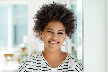 Fototapeta premium Portrait, businesswoman and smile in office with pride for work, small business and receptionist in creative agency. Personal assistant, startup and happiness with face, girl and career in New York