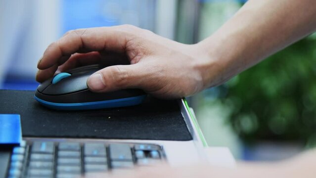 Man hand working on control panel with keybaord and mouse