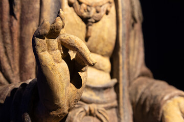 Ancient Buddha hand. Concept of energy, ethnic, harmony, meditation, peace.