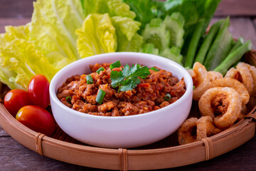 Spicy minced pork and tomato dip (Nam Prik Aong), Northern thai food .