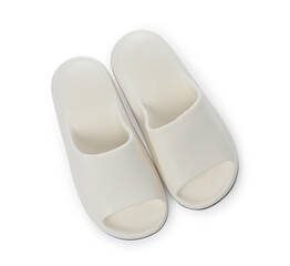 Pair of rubber slippers isolated on white, top view