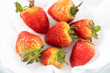 Washed and Dried Strawberries Neatly Stored in a Glass Bowl