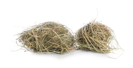 Dried hay isolated on white. Livestock feed