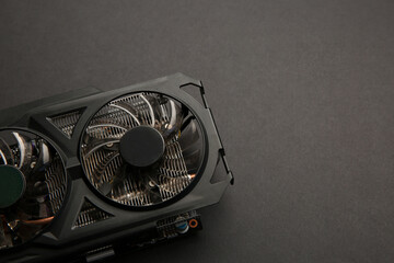 One graphics card on black background, above view. Space for text