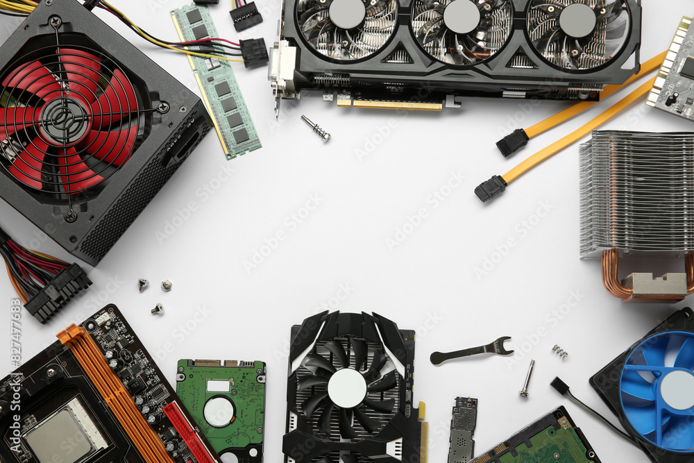 Fototapete Frame of graphics card and other computer hardware on white background, flat lay. Space for text