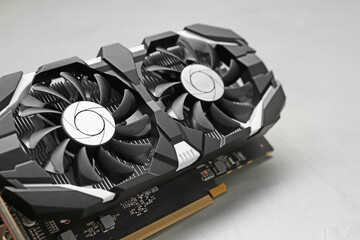 Computer graphics card on gray background, closeup
