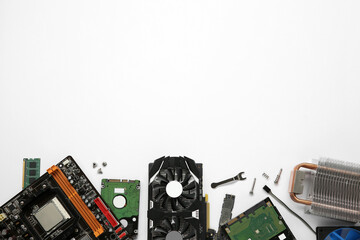 Graphics card and other computer hardware on white background, flat lay. Space for text