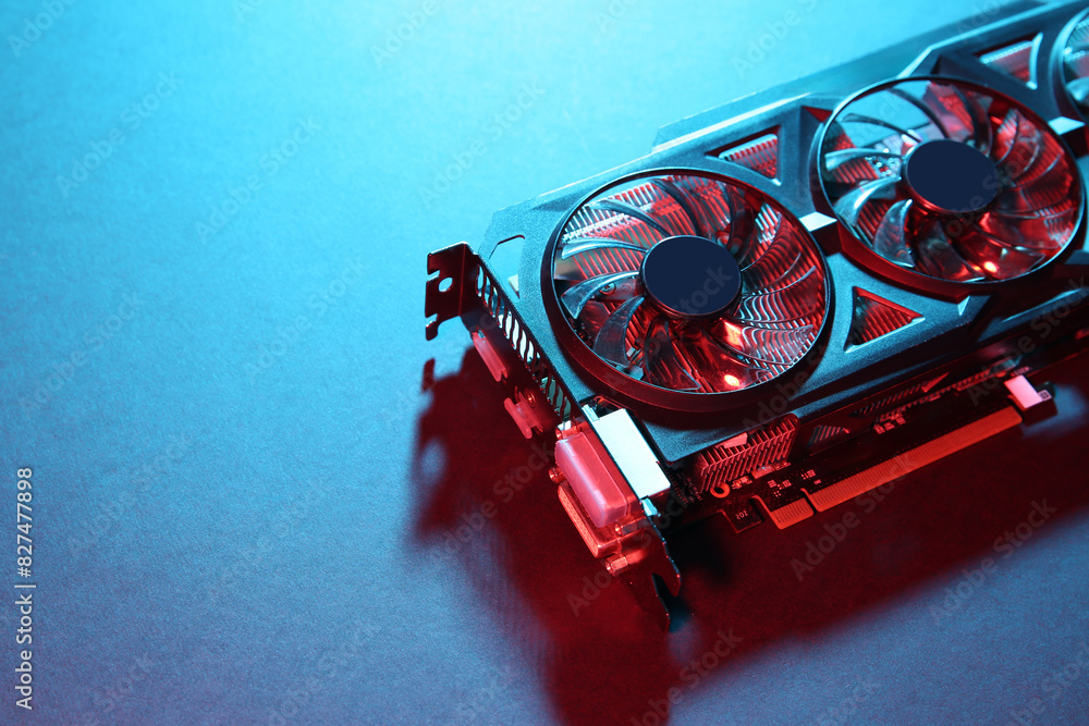 Fototapete computer graphics card on color background, closeup. space for text