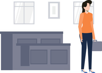 The girl is standing with a bag.