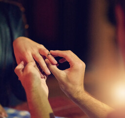 Couple, hands and engagement ring as proposal for marriage with jewelry in closeup for commitment. People, love and together on date in romantic, gesture and question for partnership or relationship