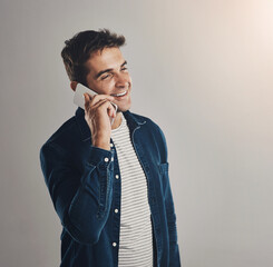 Studio, man and phone call with laugh, funny news and comedy with contact by mockup. Creative...