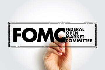 FOMC Federal Open Market Committee acronym - committee within the Federal Reserve System, conducts...
