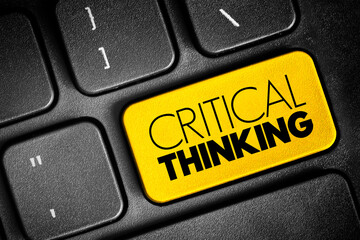 Critical thinking - analysis of facts to form a judgment, text button on keyboard
