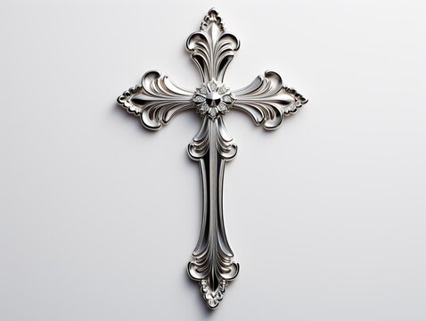 Silver cross on a white background.