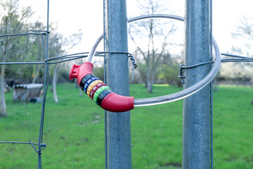 Padlock combination lock with chain on the fence