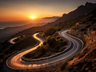 A winding mountain road vanishes into the sunset, capturing speed with blur