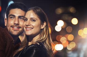 Smile, selfie and couple in city at night with bokeh for romantic date together for bonding. Love,...