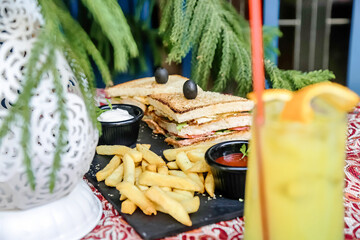 Table With Sandwich and French Fries