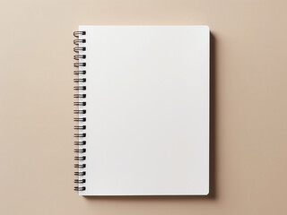 Office setup notebook awaits on beige backdrop