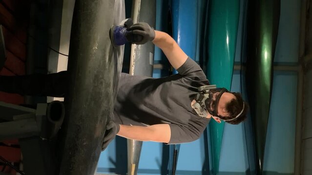 working with carbon fiber. hand power tools. vertical video. slow motion video. High quality video in 4K format.