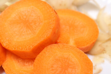 pieces of carrots. sliced and peeled carrots. carrot details. Carrot with selective focus.