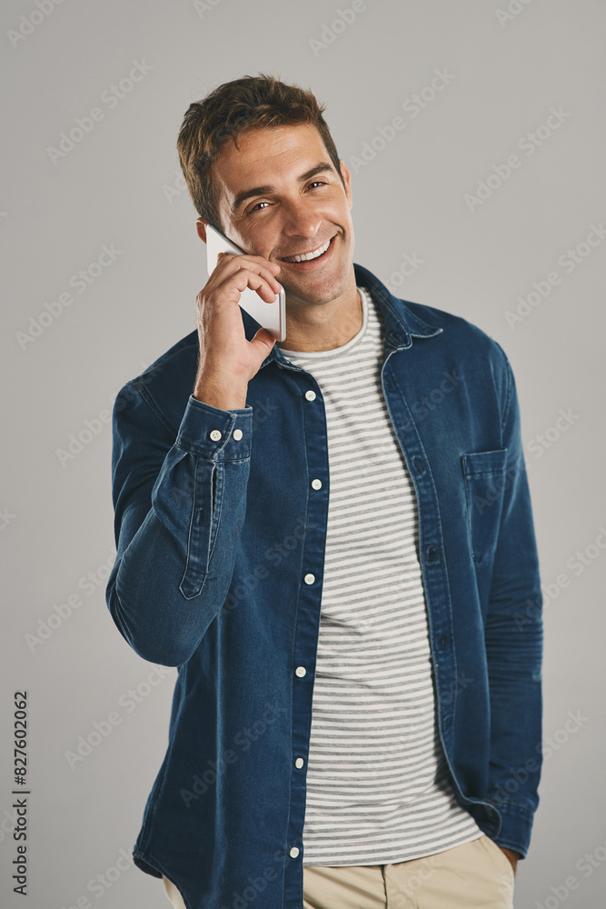 Poster studio, man and portrait in phone call with smile, funny news and comedy with contact. creative work