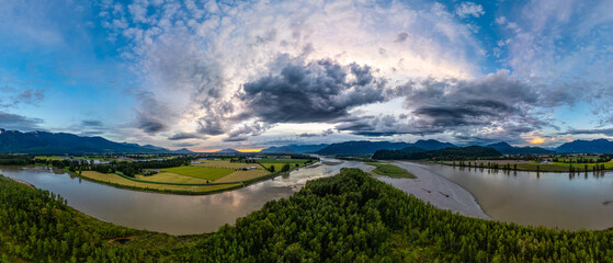 Aerial panorama of Canadian Mountain Landscape in Valley. Sunny Sunset