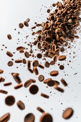 Obraz premium A close up of a pile of chocolate chips with a white background. Concept of chaos and disorder as the chocolate chips are scattered in all directions. Scene is playful and whimsical