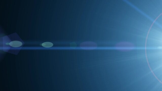 Optical anamorphic lens flares with alpha channel on a black background. Blue thin rays of light, for video.
