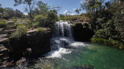Obraz premium aerial view of the Bona Espero waterfall, green water, in Chapada dos Veadeiros, Goiás