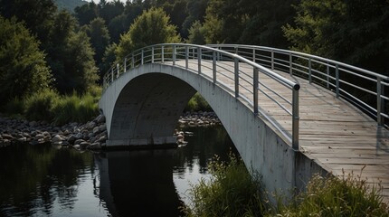 Fototapeta premium Peaceful wooden bridge arching over a tranquil river in a lush green forest, perfect for nature-themed projects, travel promotions, or serene landscape collections.