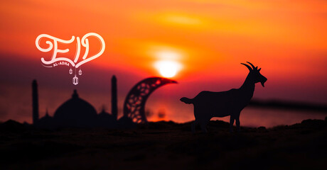 Eid Al Adha Mubarak photo, Goat and crescent moon shape on the beach with sunset sky