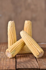 corn natural food healthy delicious vegan cooked green corn on wooden table