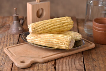 corn natural food healthy delicious vegan cooked green corn on wooden table