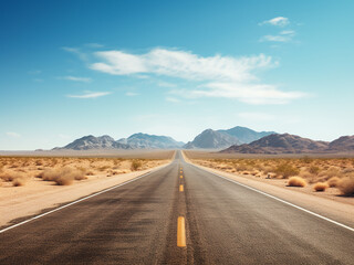 Desert highway stretches infinitely under a blazing summer sun in the Southwest