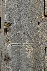 A cross carved on a ston of the Byzantine Basilica in the Kayabasi in the northeast section of the...