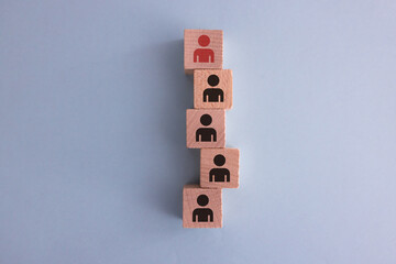 Human resources management and recruitment business build team concept, Hand putting wood cube block on top, Copy space